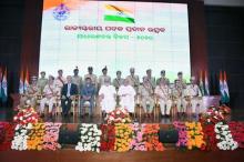 Honourable Governor Professor Ganeshi Lal presenting medals and awards in the Investiture ceremony at Convention Centre, Lokaseva Bhavan, Bhubaneswar on the occasion of Republic Day
