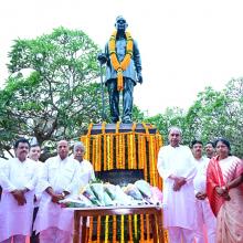 Chief Minister Shri Naveen Patnaik paying floral tribute at the statue of Dr. Harekrushna Mahatab on the occasion of his birth anniversary at OLA Premises 