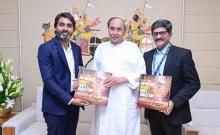 Chief Minister Shri Naveen Patnaik Releasing  Hockey World Cup Coffee Table Book by Sports Star at Naveen Niwas